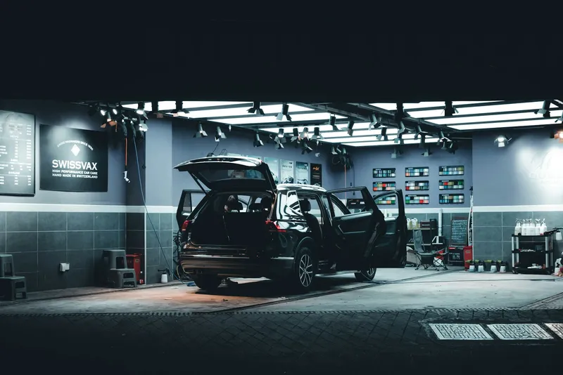 Vehicle in workshop bay — placeholder image
